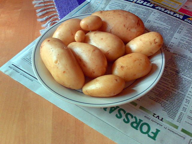 A bowl of potatoes on a table